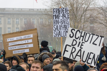 BERLIN - JANUARY 23, 2016: Russian Diaspora in Berlin protesting against migrants and refugees due to the sexual abuse of women and children.のeditorial素材