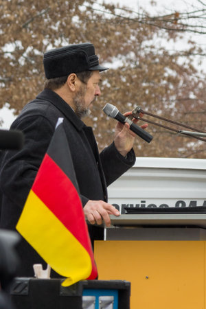 BERLIN - JANUARY 23, 2016: Russian Diaspora in Berlin protesting against migrants and refugees due to the sexual abuse of women and children.のeditorial素材