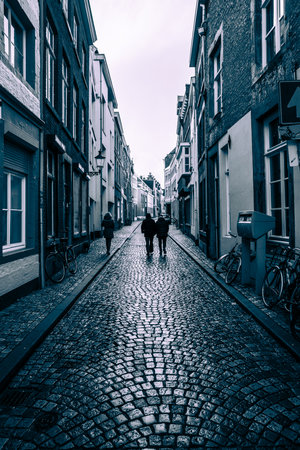 MAASTRICHT, NETHERLANDS - JANUARY 16, 2016: Old streets in the historic center. Stylization. Toning.  Maastricht is the oldest city of the Netherlands and the capital city of the province of Limburg.のeditorial素材