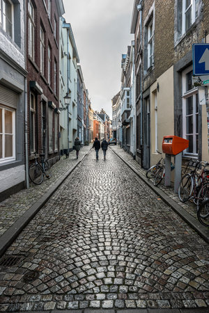 MAASTRICHT, NETHERLANDS - JANUARY 16, 2016: Old streets in the historic center. Stylization. Toning.  Maastricht is the oldest city of the Netherlands and the capital city of the province of Limburg.のeditorial素材