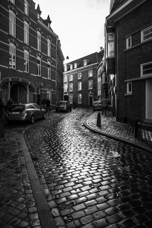 MAASTRICHT, NETHERLANDS - JANUARY 16, 2016: Old streets in the historic center. Black and white. Maastricht is the oldest city of the Netherlands and the capital city of the province of Limburg.のeditorial素材