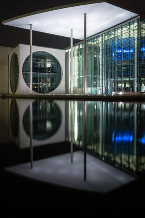 BERLIN - MARCH 05, 2016: The complex of buildings in the government quarter (Regierungsviertel). Marie-Elisabeth-Lueders-Haus and Spree river at night.のeditorial素材