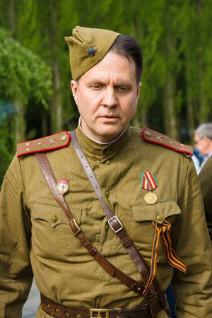 BERLIN - MAY 09, 2015: Victory Day in Treptower Park. Soviet officers in uniform during the war.のeditorial素材