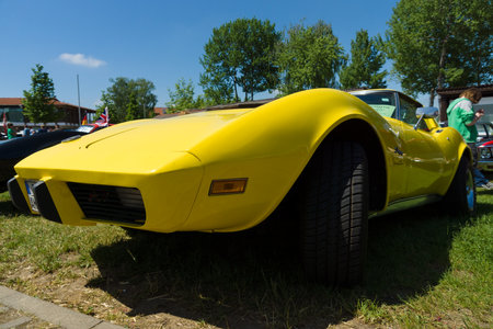 PAAREN IM GLIEN, GERMANY - MAY 19: The Chevrolet Corvette Stingray (C3) is a sports car produced by the Chevrolet division of General Motors for the 1968 through 1982 model years, "The oldtimer show" in MAFZ, May 19, 2013 in Paaren im Glien, Germanyのeditorial素材