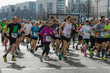 BERLIN - APRIL 03, 2016: The annual Berlin Half Marathon. Race through the city streets.のeditorial素材