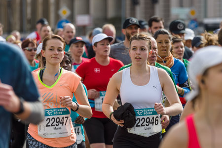 BERLIN - APRIL 03, 2016: The annual Berlin Half Marathon. Race through the city streets.のeditorial素材