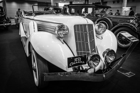 STUTTGART, GERMANY - MARCH 17, 2016: Vintage car Auburn 852 Phaeton Sedan, 1936. Black and white. Europe's greatest classic car exhibition "RETRO CLASSICS"のeditorial素材