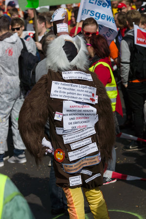 BERLIN - MAY 01, 2016: An activist in the neck suit. Members of trade unions, workers and employees at the demonstration on the occasion of Labour day.のeditorial素材