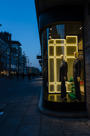 STUTTGART, GERMANY- MARCH 16, 2016: The historic shopping street in the central part of the city - Koenigstrasse (King Street) and a showcase boutique BOSS.のeditorial素材