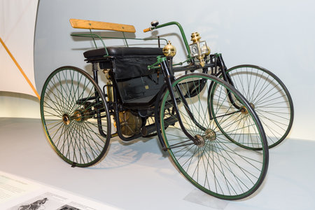STUTTGART, GERMANY- MARCH 19, 2016: Daimler motorized quadricycle - the "wire-wheel car" (Daimler Motor-Quadricycle, "Stahlradwagen"), 1889. Mercedes-Benz Museum.のeditorial素材