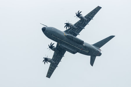 BERLIN, GERMANY - JUNI 01, 2016: Demonstration flight at rainy day of the military transport aircraft Airbus A400M Atlas. Exhibition ILA Berlin Air Show 2016のeditorial素材