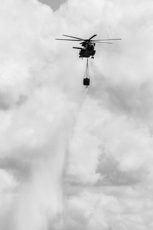 BERLIN, GERMANY - JUNE 02, 2016: Heavy-lift cargo helicopter Sikorsky CH-53 Sea Stallion of the German Army with equipment for fighting fires. Black and white. Exhibition ILA Berlin Air Show 2016のeditorial素材