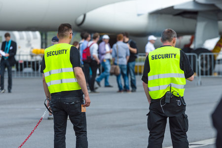 BERLIN, GERMANY - JUNE 03, 2016: Security staff at the airfield. Exhibition ILA Berlin Air Show 2016のeditorial素材