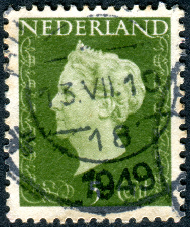 NETHERLANDS - CIRCA 1948: A stamp printed in the Netherlands, shows Wilhelmina of the Netherlands, circa 1948のeditorial素材
