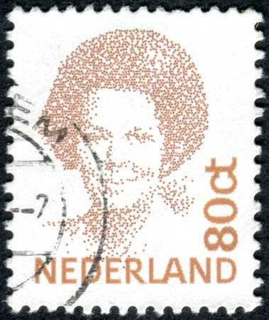 NETHERLANDS - CIRCA 1991: A stamp printed in the Netherlands, shows Beatrix of the Netherlands, circa 1991のeditorial素材