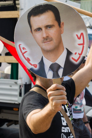 BERLIN, GERMANY - AUGUST 03, 2013: International Quds Day. A group of demonstrators supporting the...