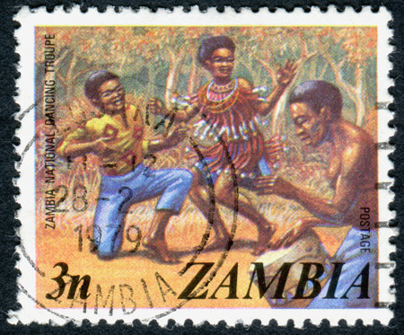 ZAMBIA - CIRCA 1975: A stamp printed in Zambia, shows Zambian dancers, circa 1975のeditorial素材