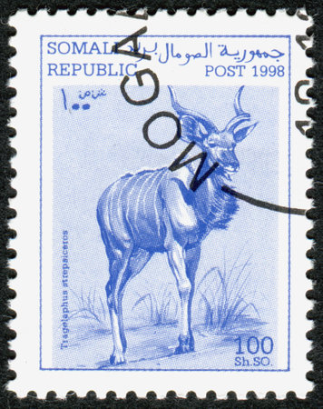 SOMALIA - CIRCA 1998: A stamp printed in Somalia, shows the animal Greater kudu (Tragelaphus strepsiceros), circa 1998のeditorial素材