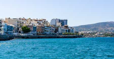 CRETE, GREECE - JULY 11, 2016: The embankment of a small elite tourist town - Elounda, municipality of Agios Nikolaos.のeditorial素材
