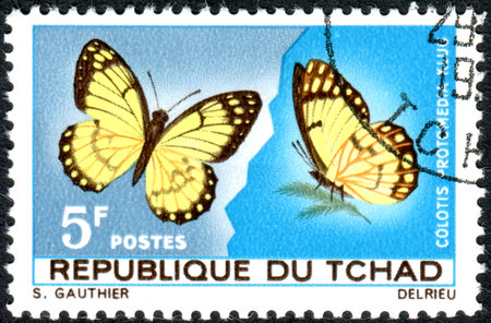 CHAD - CIRCA 1967: A stamp printed in Chad, shows the butterfly Yellow Splendour Tip (Colotis protomedia), circa 1967のeditorial素材