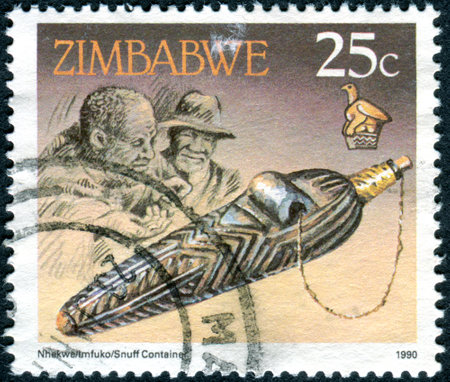 ZIMBABWE - CIRCA 1990: A stamp printed in Zimbabwe, shows the Snuff container, circa 1990のeditorial素材
