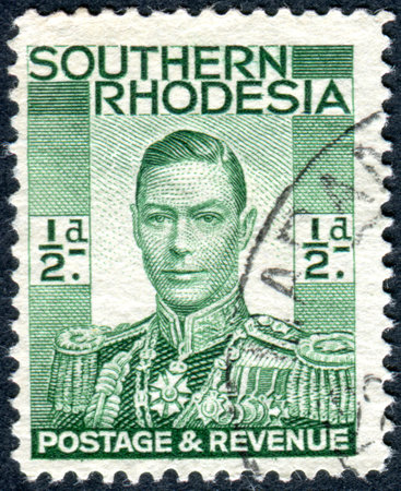SOUTHERN RHODESIA - CIRCA 1937: A stamp printed in Southern Rhodesia, shows the portrait King George VI, circa 1937のeditorial素材