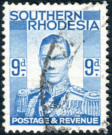 SOUTHERN RHODESIA - CIRCA 1937: A stamp printed in Southern Rhodesia, shows the portrait King George VI, circa 1937のeditorial素材