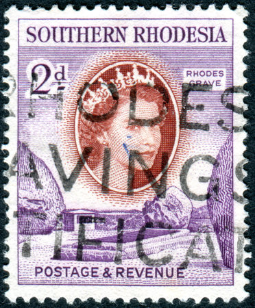 SOUTHERN RHODESIA - CIRCA 1953: A stamp printed in Southern Rhodesia,  shows a grave of Cecil Rhodes, circa 1953のeditorial素材