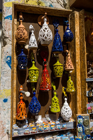 HERAKLION, GREECE - JULY 16, 2016: Sale of souvenirs (clay lamps) on the main tourist street.のeditorial素材