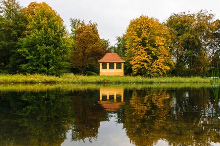 City pond in the autumn park.の写真素材