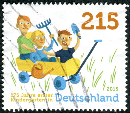 GERMANY - CIRCA 2015: A stamp printed in Germany, dedicated to the 175th anniversary of the 1st Kindergarten in Germany, circa 2015のeditorial素材
