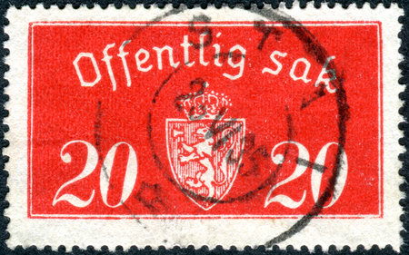 NORWAY - CIRCA 1938: A stamp printed in the Norway, shows the coat of arms, circa 1938のeditorial素材