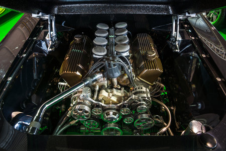 STUTTGART, GERMANY - MARCH 03, 2017: The fuel injected 460 big block the Ford engine (550 HP, 7,5L) of the Ford Mustang, 1967. Europe's greatest classic car exhibition "RETRO CLASSICS"のeditorial素材