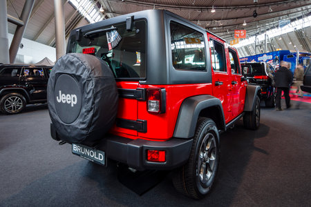 STUTTGART, GERMANY - MARCH 03, 2017: Mid-size SUV Jeep Wrangler Unlimited Rubicon, 2016. Rear view. Europe's greatest classic car exhibition "RETRO CLASSICS"のeditorial素材
