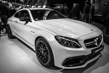 STUTTGART, GERMANY - MARCH 03, 2017: Compact luxury car Mercedes-AMG C63 S Coupe, 2016. Black and white. Europe's greatest classic car exhibition "RETRO CLASSICS"のeditorial素材