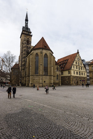 STUTTGART, GERMANY - MARCH 01, 2017: Schillerplatz - square in the old city, named in honor of the German poet Friedrich Schiller. In the background, Fruchtkasten building and Collegiate Church.のeditorial素材