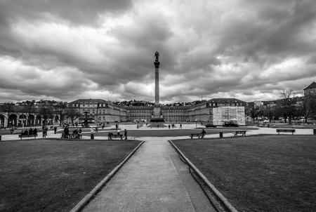 STUTTGART, GERMANY - MARCH 01, 2017: Schlossplatz (Palace Square) at dawn with the Jubilaeumssaeule (Jubilee column) in front of the New Palace. Black and white.のeditorial素材