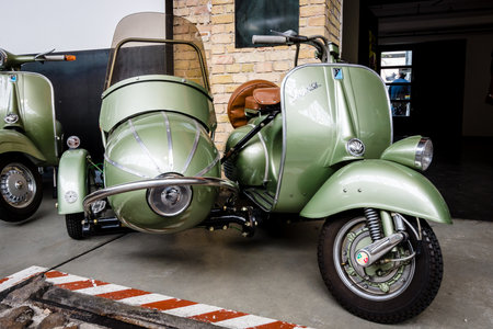 BERLIN - MAY 13, 2017: Scooter Vespa with Cozy Sidecar. Exhibition "Oldtimertage Berlin-Brandenburg".のeditorial素材