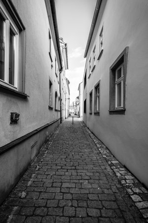 SCHWEINFURT, GERMANY - APRIL 21, 2017: Old streets in the historic part of the city. Black and white. Schweinfurt - a medieval city founded in 761 year.のeditorial素材
