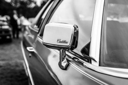 PAAREN IM GLIEN, GERMANY - JUNE 03, 2017: Rear-view mirror of the Cadillac Coupe de Ville. Black and white. Exhibition "Die Oldtimer Show".のeditorial素材