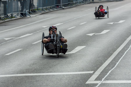BERLIN - APRIL 02, 2017: The annual 37th Berlin Half Marathon. Wheelchair competitors & hand cyclists.のeditorial素材