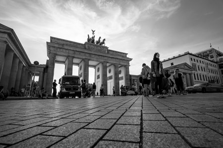 BERLIN - JULY 09, 2017: The famous symbol of Berlin - Brandenburg vorotama and Pariser Platz. Black and white.のeditorial素材