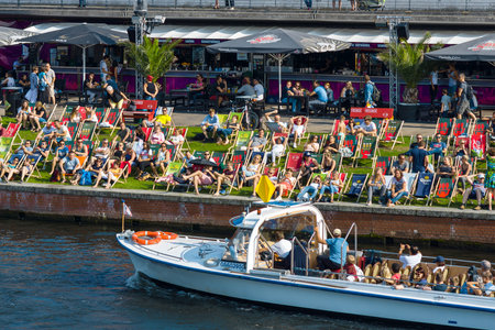 BERLIN - JULY 09, 2017: Cafe on the embankment Spree. Resting place visitors and residents of Berlin.のeditorial素材