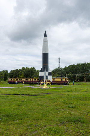 PEENEMUENDE, GERMANY - JULY 18, 2017: Territory of the Army Research Center. Replica V-2 rocket in the foreground. During the World War II, the area was highly involved in the development and production of the V-2 rocket.のeditorial素材