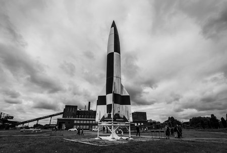 PEENEMUENDE, GERMANY - JULY 18, 2017: Territory of the Army Research Center. Replica V-2 rocket in the foreground. Black and white. During the World War II, the area was highly involved in the development and production of the V-2 rocket.のeditorial素材