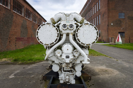 PEENEMUENDE, GERMANY - JULY 18, 2017: Old ship diesel engine. Territory of the Army Research Center. During the World War II, the area was highly involved in the development and production of the V-2 rocket.のeditorial素材