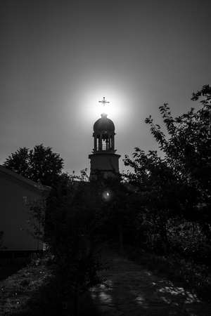 Orthodox monastery of St. George. The bell tower above the Sacred source of water. Pomorie. Bulgaria. Black and white.の写真素材