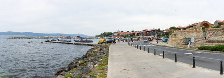 NESEBAR, BULGARIA - AUGUST 21, 2017: Panoramic view of the seaport and the ruins of the ancient...