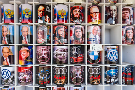 CAPE KALIAKRA, BULGARIA - AUGUST 23, 2017: Background of souvenir mugs with images of various politicians, actors or car brands.のeditorial素材