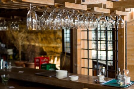 Clean glasses over the bar.の写真素材